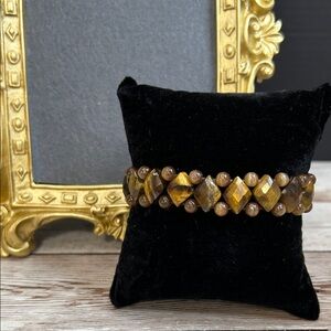 Stretch bracelet featuring diamond-shaped tiger's eye stone & cats eye glass